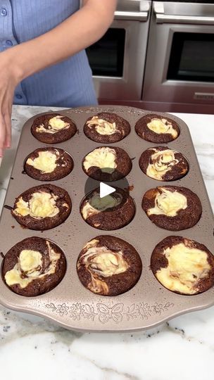 3.4M views · 37K reactions | Easy & yummy 1 pan dessert | Easy & yummy 1 pan dessert

I make brownie cups with cookie dough and cheesecake filling. | By Justine Kameron | You're going to love this easy
three ingredient treat. We're starting off with some premade
chocolate chip cookie dough and we're putting it in our greased
muffin tin. Next, I'm going to bring in my brownie mix. I did
the chewy fudge brownie mix and we're going to add a scoop of
our brownie mix right into our muffin tin on top of that
chocolate chip cookie dough. You can do everything homemade
if you prefer. Next, we're going to add a scoop of our
cheesecake no bake. This stuff so yummy. Just add a scoop
right on top of that brownie mix. Grab a toothpick and mix
the brownie and cheesecake together. Put it in the oven at
3 Cookie Brownie Cheesecake Muffin Tin, Brownie Cheesecake Bites, Chewy Fudge, Chocolate Chip Cookie Dough Brownies, Justine Kameron, Homemade Cookie Dough, Chocolate Chip Cookie Cheesecake, Cheesecake No Bake, Cookie Cheesecake