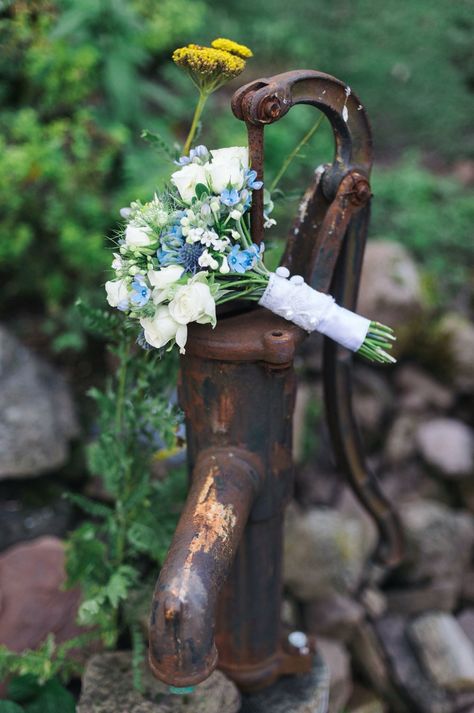 My bouquet featured white roses, blue hydrangea, blue thistle and forget-me-nots and we used the lace cuffs from my mother's wedding dress as a vintage bouquet holder. Bridal Bouquet Forget Me Nots, Forget Me Not Bouquet Wedding, Thistle Bouquet Wedding, Blue Hydrangea Bouquet, Flowers 2023, Blue Spring Flowers, Prom 23, Thistle Wedding, Hydrangea Blue