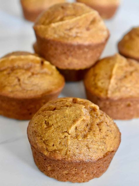 Pumpkin Applesauce Muffins are a deliciously moist and lightened-up muffin recipe made with canned pumpkin, applesauce, and cinnamon. Ready in just 20 minutes! Applesauce Muffins Easy, Muffins Made With Applesauce, Pumpkin Applesauce Muffins, Muffins With Applesauce, Pumpkin Applesauce, Pumpkin Sweets, Moist Pumpkin Muffins, Mini Chocolate Chip Muffins, Gluten Free Pumpkin Spice