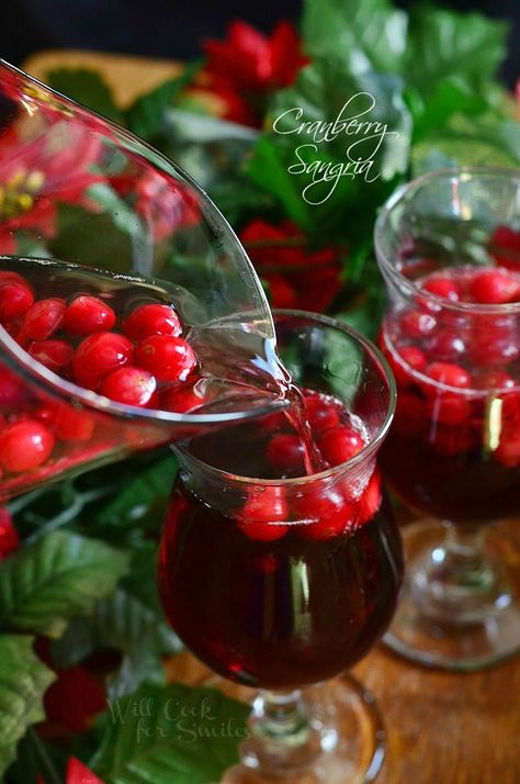 Cranberry Sangria. Delicious holiday cocktail made with fresh cranberries, cranberry flavored vodka, juice and red wine. #sangria #cranberry #holidaydrink #cranberrysangria Cranberry Sangria, Seasonal Cocktail, Christmas Cranberry, Holiday Drink, Wine Sangria, Spanish Wine, Christmas Entertaining, Christmas Cocktail, Cocktail Drink