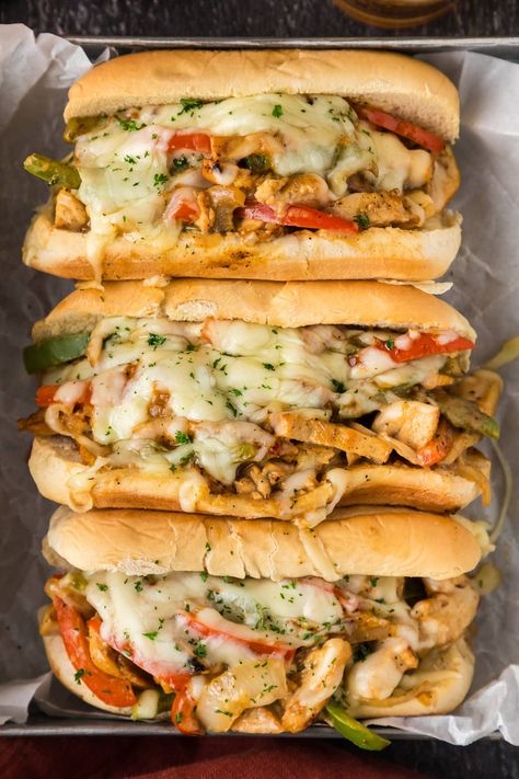 A chicken philly cheesesteak recipe loaded with sauteed bell peppers, onion, chicken, and melty cheese atop a soft hoagie bun is a lighter twist on the classic sandwich. Chicken Philly Cheesesteak Recipe, Philly Cheesesteak Recipe, Chicken Philly Cheesesteak, Philly Sandwich, Hoagie Sandwiches, Chicken Cheesesteak, Chicken Philly, Philly Cheese Steak Recipe, Cheesesteak Recipe