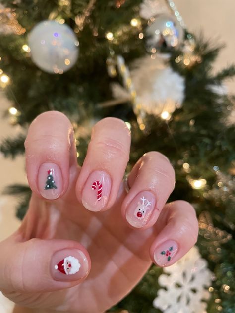 Santa Christmas nails Xmas nail art candy cane mini ideas reindeer Rudolph holly nails Christmas Nails Santa Claus, Short Cute Christmas Nails, Christmas Nails Tree, Nail Art Christmas Designs, Short Xmas Nails, Christmas Short Nails, Santa Claus Nails, Simple Christmas Nail Art, Candy Cane Nail Art