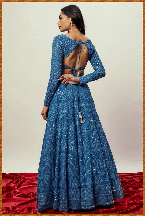 [Ad] Alia Cobalt Blue Threadwork Lehenga Set. The Floral Lehenga Is Intricately Embellished With Thread And Sequins All Over. It Is Teamed With A Matching, Full Sleeved Choli . A Net Dupatta With Zari And Sequin Border And Buttis Complete The Look. Cancan And Pockets Are Included. Stitched Blouse With Deep V Neck Type. Lehenga Comes With Can Can And Blouse With Padding. Composition / Material: Viscose Georgette Lehenga And Blouse With Soft Net Dupatta In #backlessblousedesignssleevelesslatest Full Sleeves Blouse Designs, Choli Blouse Design, Full Sleeves Design, Full Sleeve Blouse, Floral Lehenga, Backless Blouse Designs, Lehenga Designs Simple, Latest Model Blouse Designs, Fashionable Saree Blouse Designs