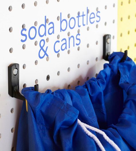 Taking cans and bottles to your return center is less of a hassle when you dedicate a bag or other container to the job. Hang the bag from a pair of hooks (using two hooks ensures stability) and add a label so everyone knows what items can be returned for a deposit. Recycle Organization, Ideas For Recycling, Organization Bins, Storage Organization Ideas, Recycling Storage, Recycling Station, Recycling Information, Recycle Cans, Recycling Center