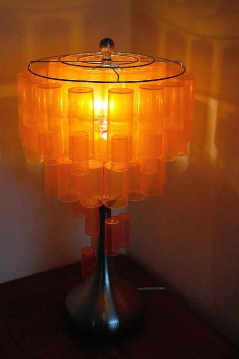 Pill Bottle Sculpture, Empty Pill Bottle Crafts, Reuse Pill Bottles, Pop Bottle Crafts, Medicine Bottle Crafts, Pill Bottle Crafts, Pill Bottle, Diy Christmas Garland, Orange Glow