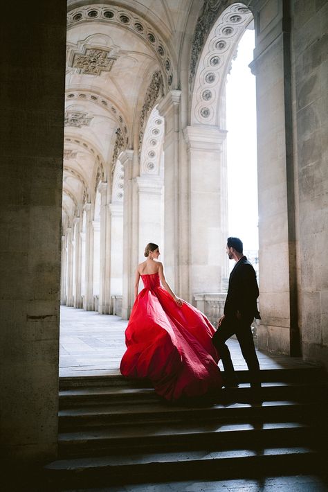 Red Dress Engagement Shoot, Red Dress And Suit Couple, Red Dress Couple Photoshoot, Elegant Couple Photoshoot Classy, Hotel De Crillon Paris, Flowy Dress Photography, Hotel De Crillon, Italy Photoshoot, Engagement Videos