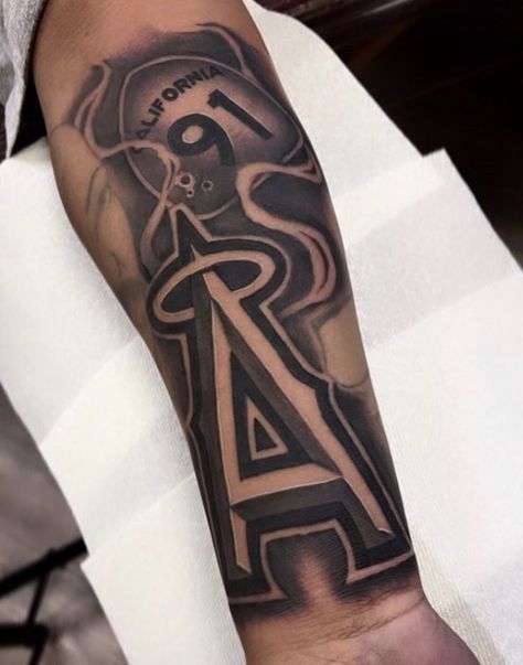 Boston Tattoos For Men, Anaheim Angels Tattoo, Anaheim Tattoo, Arm Tattoos Lettering, Belle Tattoo, Cherub Art, Family Quotes Tattoos, Lettering Tattoos, Brian Dawkins