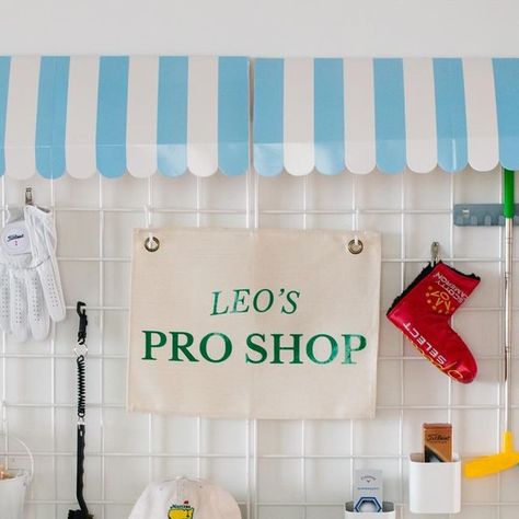 Shindig Party Goods ✹ Utah Party Rentals on Instagram: "THE PRO SHOP. Available 2.23.24!  Complete with a cute-as-can-be awning, ca(n)ddy buffet, personalized sign, and a grid display perfect for hanging all the golf goodies. I’M IN LOVE! ⛳️❤️ You too? Thought so.  #golfparty #golfbirthdayparty #golfpartyideas #golf #partyinspo #utahpartyrentals #kidsparty #kidspartyideas #birthdaypartyinspo" Golf Theme Party Ideas, Pro Shop Display, Kids Golf Party, Golf Pro Shop, Golf Theme Party, Golf Birthday Party, Golf Party, Golf Theme, Golf Birthday