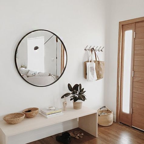 Minimalist Entryway Essentials - Organizing Ideas | Apartment Therapy Minimal Entryway, Minimalist Entryway, Decoration Hall, Vstupná Hala, Entryway Inspiration, Foyer Decorating, Mirror On The Wall, Metal Hangers, Decor Minimalist