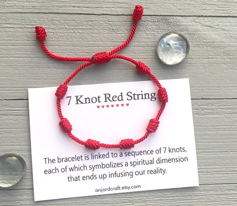 The bracelet is linked to a sequence of seven knots, each of which symbolizes a spiritual dimension that ends infusing our reality. It is also believed that the red string helps to channel positive energy for good luck and provide protection against evil. Bracelet Features: (1) 1.5mm Durable Twisted Nylon Cord (2) Bracelet is adjustable to fit most wrist sizes (3) Bracelet thickness (width) is 1.5mm (4) Please contact me if you need clarification Red String Of Fate Bracelet, Nutcracker Watercolor, Evil Bracelet, 26th Wedding Anniversary, String Of Fate, Red String Of Fate, Kabbalah Bracelet, Spiritual Dimensions, Bracelet Evil Eye