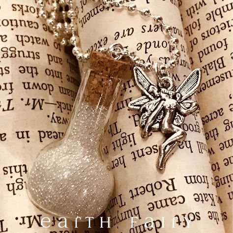 @EarthFairyStore posted to Instagram: Tap the link in my bio for more info -> @earthfairystore This is a general purpose fairy dust, white in colour, suitable for good dreams, making wishes, good luck and happiness. It comes on a shiny silver ball chain and has a lovely fairy charm attached. Dimensions:50cm chain with 3cm bottle #fairydust #fae #fairy #fairytale #fantasy #woodland #pixie #fairies #faery #magical #magic #mystical #imagination #faerie #wishingonastar #witchyjewelry #fairyjewelry Fairy Dust Necklace, Fantasy Woodland, Fairy Flowers, Earth Fairy, Good Dreams, Fairy Charms, Musical Jewelry Box, Fairy Gifts, Magical Fairy