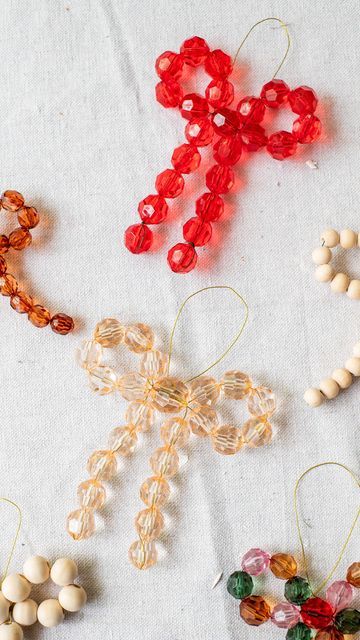 Christmas Ornaments Beads Diy, Diy Beaded Bow Ornaments, Christmas Beads Decorations, Beaded Bow Ornament Diy, Easy Beaded Ornaments Diy, Bow Christmas Decorations, Bead Bow Ornament, Diy Ornaments Christmas Easy, How To Make Christmas Ornaments Easy Diy