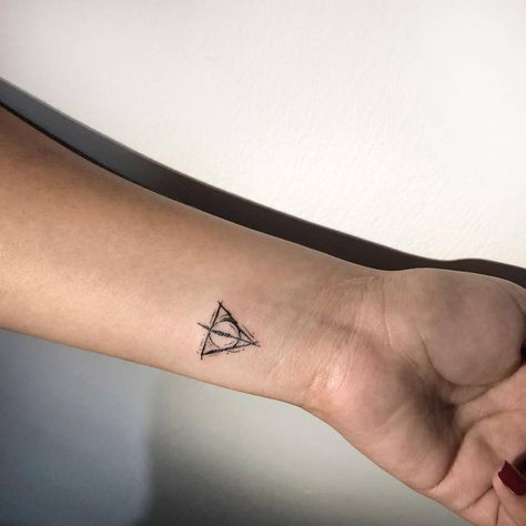 Tiny Deathly Hallows Tattoo, Harry Potter Deathly Hallows Symbol, Books Harry Potter, Hallows Tattoo, Tattoo On The Wrist, English Culture, Wrist Tattoo Cover Up, Deathly Hallows Symbol, Potter Tattoo