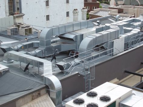 download complex interconnecting air ducting on a roof top Industrial Air Conditioning, Hvac Design, Roof Cap, Large Backyard Landscaping, Air Ducts, Cooling Tower, Building Images, Free Backgrounds, Hvac Services