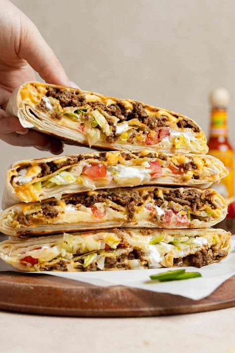 Recreate Taco Bell's iconic Crunchwrap Supreme at home—it's incredibly easy and arguably better than the drive-thru version. Turkey Supreme, Taco Bells, Chipotle Sofritas, Taco Bell Crunchwrap Supreme, Taco Bell Crunchwrap, Crunchwrap Supreme, Starbucks Egg Bites, Restaurant Dishes, Sloppy Joe