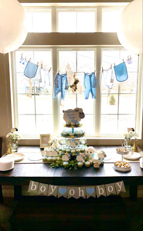 Dreamy little lamb baby shower. Perfect if you are having a girl or a boy. Baby Shower Table Set Up Ideas Layout, Baby Shower Aesthetic Boy, Simple Blue Baby Shower Ideas, Simple Boy Baby Shower Ideas, Baby Shower Picture Backdrop, Oh Boy Baby Shower Ideas, Boy Baby Shower Table, Denim Baby Shower, Boy Baby Shower Food