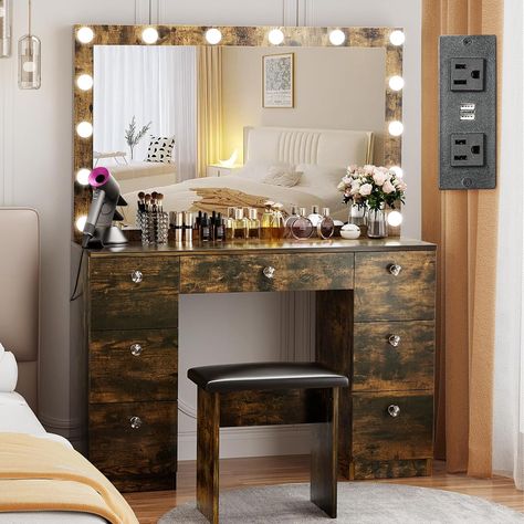 Transform your morning routine with our Farmhouse Vanity featuring a Lighted Mirror – where practicality meets rustic elegance. This thoughtfully crafted piece combines ample storage with a touch of vintage charm. The lighted mirror enhances your grooming experience, providing perfect illumination for flawless makeup application or a close shave. Rustic Makeup Vanity Ideas, Rustic Makeup Vanity, Vanity Desk With Mirror, Shelf Bedroom, Desk With Mirror, Makeup Vanity Desk, Painted Vanity, Mirrored Vanity Desk, Bedroom Dressing