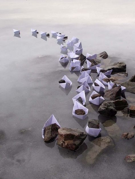 Slawek Matyjaszewski: Paper boats on the water Boats In Water, Refugees Art, Sculpture Contemporary Art, Paper Boats, Sculpture Contemporary, Origami Boat, Boat Art, Paper Boat, Water Art