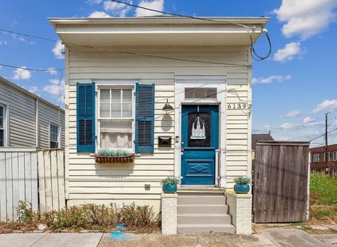 Shotgun House Interior, Backyard Entertainment, Blue Siding, Shotgun House, Refinishing Hardwood Floors, New Orleans Homes, Old Houses For Sale, Backyard Entertaining, New Kitchen Cabinets