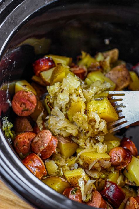 Saurkraut And Polish Sausage, Kielbasa Sauerkraut And Potatoes, Sausage And Sauerkraut Recipes, Polish Sausage Sauerkraut And Potatoes, Sauerkraut And Potatoes, Sauerkraut Crock, Sausage Crockpot Recipes, Polish Sausage Recipes, Sausage Sauerkraut