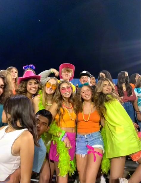 Costume Theme Football Game, Neon Hoco Theme Outfit, Highschool Game Day Outfit, Neon Football Game Outfit, Neon Outfit Ideas For Football Games, Neon Game Day Outfits, Neon Football Game Theme Outfit Paint, Neon Game Theme, Game Day Themes