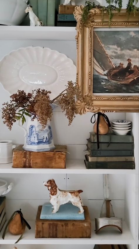 Cottage Shelf Styling, How To Display Vintage Books, Vintage Farmhouse Shelf Decor, Books On Mantle Decor, French Country Shelf Styling, French Shelf Styling, Styling Large Shelves, French Country Bookshelf Ideas, French Country Shelf Decor