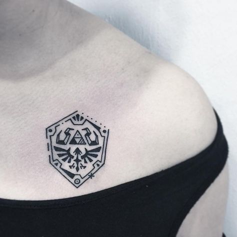 Zelda Tattoo Ideas Symbols, Small Triforce Tattoo, Hyrule Shield Tattoo, Zelda Shield Tattoo, Triforce Tattoo, Witcher Tattoo, Sky Tattoo, Patchwork Tattoos, Shield Tattoo