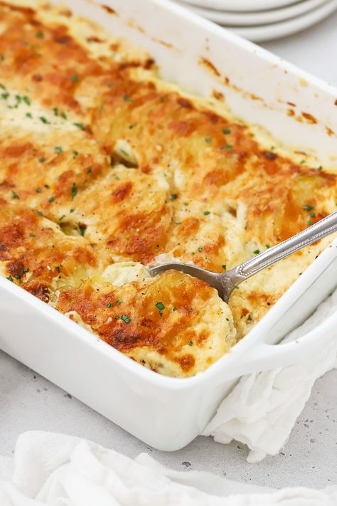 These easy cheesy gluten-free scalloped potatoes (aka gluten-free au gratin potatoes) are a total crowd pleaser! It's such a popular potato side dish recipe for holidays and special occasions. We make our scalloped potatoes recipe with NO flour so it's naturally gluten-free and delicious. Everyone loves this creamy cheesy potatoes recipe! Gluten Free Au Gratin Potatoes, Scalloped Potatoes Without Flour, Scalloped Potatoes No Flour, Gluten Free Cheesy Potatoes, Gluten Free Scalloped Potatoes, Scalloped Potatoes Au Gratin, Creamy Cheesy Potatoes, Scallop Potatoes, Scalloped Potatoes Recipe