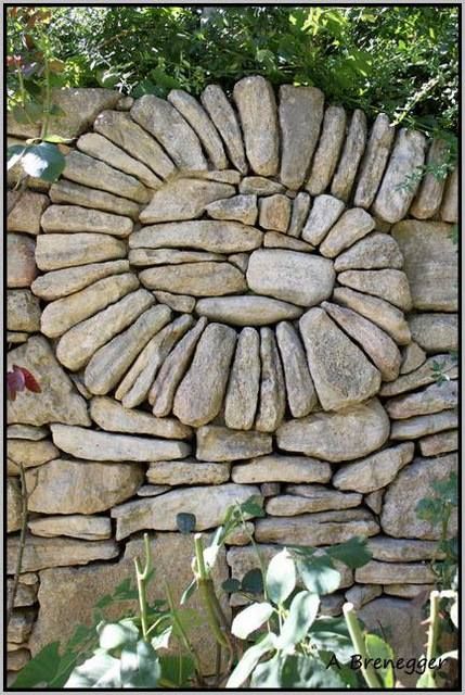 Stacked stone wall with curved element.what a beautiful use of stone. Stacked Stone Wall, Stone Walls Garden, Stacked Stone Walls, Rock Walls, Stone Wall Art, Garden Walls, Outdoor Stone, Dry Stone Wall, Dry Stone