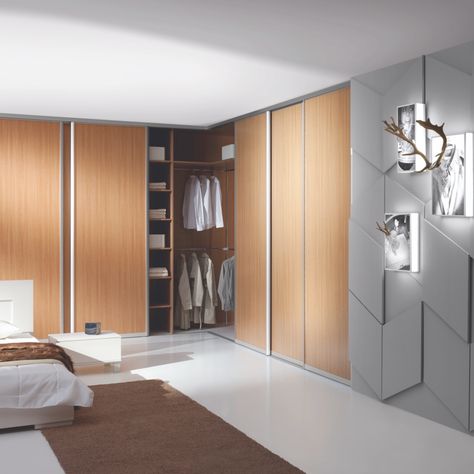 Our Aluminum Lazuryt Magnetic Sliding Doors come together in a corner to create a closet or close up a space with an “L-Shaped” configuration. When in an opened position you can access almost the entire space as the doors can slide behind existing walls. Available with several laminate wood and glass options. Special magnetic strip holds the corner doors together. Corner Wardrobe Closet, Office Partitions Wall, Folding Wardrobe, Multifunctional Room, Fitted Bedroom Furniture, Bedroom Wardrobe Design, Corner Wardrobe, Fitted Bedrooms, Wardrobe Interior Design