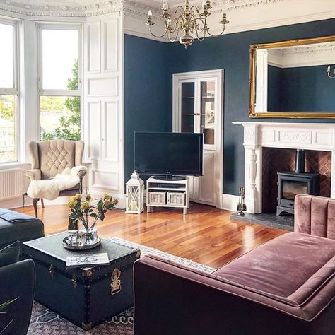 We adore the combination of the deep blue walls and pink couch in this lounge. It works well in this period property. from the home of @seasidevictorianhome on Instagram. Deep Blue Walls, Living Room Wallpaper Ideas, Victorian Lounge, Paint Living Room, Room Wallpaper Ideas, Victorian Renovation, Living Room Wallpaper, Living Room Aesthetic, Victorian Living Room