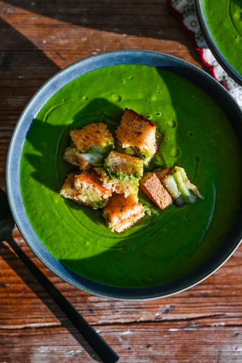 This super green sheet pan soup is the perfect recipe to make when you need an extra dose of vegetables. It's packed with nutritious ingredients like leeks, zucchini, spinach, broccoli, cauliflower, potatoes and peas and it's topped with the most delicious pesto grilled cheese croutons. This is an easy 45-minute recipe that everyone will love! Pesto Grilled Cheese, Potatoes And Peas, Grilled Cheese Croutons, Pesto Potatoes, Cheese Croutons, Cauliflower Potatoes, Pea Pesto, Making Grilled Cheese, Green Soup