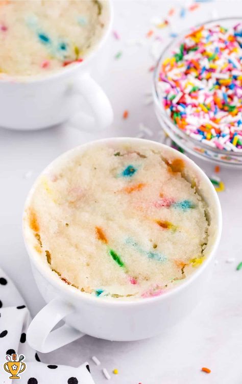 This Vanilla Mug Cake is a quick, easy dessert made in just minutes with simple ingredients. Perfect for satisfying sweet cravings fast! White Mug Cake, 2 Minute Desserts, Sugar Cookie Mug Cake, Mug Cake Microwave Easy 3 Ingredients, Birthday Cake Mug Cake, Mug Cake Vanilla, Mug Cake Without Egg, Easy Mug Cake Recipe, Vanilla Mug Cake Recipe