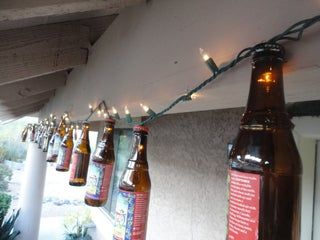 Beautiful Beer Bottle Christmas Lights : 4 Steps - Instructables Beer Bottle Lights, Beer Bottle Decor, Ornament Hangers, Chicken Coop Garden, Diy String Lights, Beer Bottle Caps, Brown Bottles, Bottle Decor, Wine Bottle Diy Crafts