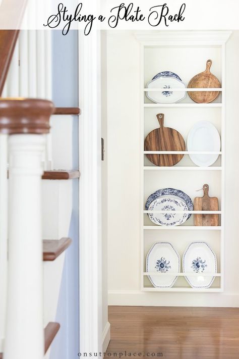 Tips for styling a wall plate rack that are easy and very quick. Suggestions for mixing textures, how to use color, and spacing ideas. #platerack #platesonwall #platerackideas #wallplaterack Styling A Wall, Platter Rack, Wall Plate Rack, Plate Rail, Plate Rack Wall, Diy Plate Rack, Platter Display, Builder Grade Kitchen, Plate Shelves