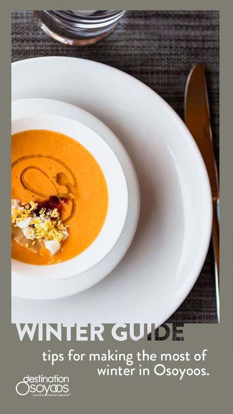 Photo features a close up of orange-coloured soup in a white bowl, centered on a white plate with a dark grey place setting. There is a light sage green coloured frame around the photo with the words "Winter Guide - tips for making the most of winter in Osoyoos" on it, and a white Destination Osoyoos logo in the bottom left corner. Osoyoos Bc, Vacation 2024, Wine Festival, Mountain Resort, Craft Beer, The Top, Things To Do, Beer, Wine