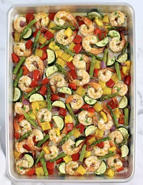 Sheet Pan Shrimp and Veggies This recipe for Sheet Pan Shrimp and Veggies is bursting with perfectly seasoned shrimp and a colorful mix of fresh veggies. It's a quick and easy meal, ideal for busy weeknights.#sheetpandinner #sheetpanshrimp #sheetpanveggies Sheet Pan Shrimp And Veggies, Veggie Marinade, Shrimp Casserole Recipes, Shrimp And Veggies, Shrimp Casserole, Seasoned Shrimp, Sheet Pan Shrimp, Pan Shrimp, Oven Vegetables