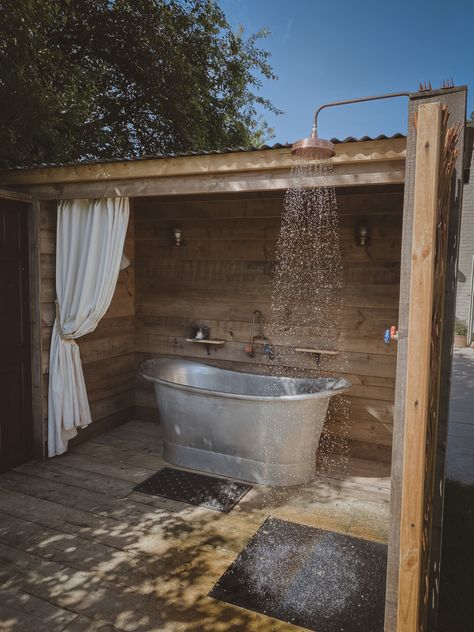 We built a bath cabin from reclaimed materials and installed a lucrious double ended tin bath and an copper shower Diy Outdoor Bathhouse, Outdoor Shower And Tub Ideas, Rustic Outdoor Bathroom Ideas, Outside Bathtub Ideas, Outdoor Shower Aesthetic, Outdoor Bath House, Outside Bathtub, Tin Bath, Workers Cottage