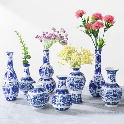 PRICES MAY VARY. Rich Variety of Styles and Amount: with 8 styles and 1 vase per style, the blue and white porcelain vases offer a rich variety of options for your decor needs, the different designs each convey the breathing of Chinese culture and tradition, add a classic touch of beauty and charm to your home or office Authentic Chinoiserie Vase: made of quality porcelain, the decorative vases features intricate paintings that showcase the authentic art of Chinese Chinoiserie, the charming desi Blue And White Vase With Flowers, Blue And White Vases With Flowers, Art Centerpieces, Centerpieces Living Room, Intricate Paintings, Table Decor Centerpieces, Blue And White Vases, Vase Blue And White, Living Room Bookshelf