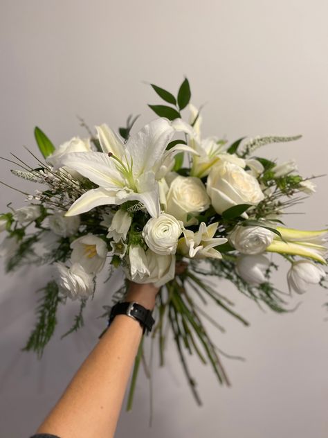 Textured white florals. Roses, lilies, ranunculus, tulips Tulip Lily Bouquet, Tulips And Lilies Bouquet, White Tulips Bridesmaid Bouquet, Lily Bridal Bouquet White, White Anthurium Bouquet, White Anthurium Bridal Bouquet, Tulip Wedding, Lily Bouquet, Stargazer Lily