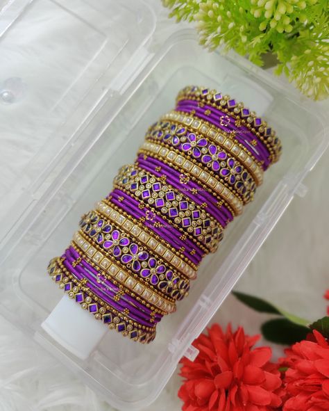 ⚜️ Customized Bridal Bangles for purple silk saree 💜💜 ✨ 𝗖𝗲𝗹𝗲𝗯𝗿𝗮𝘁𝗲 𝘁𝗵𝗲 𝘀𝗽𝗲𝗰𝗶𝗮𝗹 𝗯𝗼𝗻𝗱 𝘄𝗶𝘁𝗵 𝗰𝘂𝘀𝘁𝗼𝗺𝗶𝘇𝗲𝗱 𝘀𝗶𝗹𝗸 𝘁𝗵𝗿𝗲𝗮𝗱 𝗞𝘂𝗻𝗱𝗮𝗻 𝗯𝗮𝗻𝗴𝗹𝗲𝘀, 𝗮 𝘁𝗶𝗺𝗲𝗹𝗲𝘀𝘀 𝗰𝗼𝗻𝗻𝗲𝗰𝘁𝗶𝗼𝗻 𝘄𝗿𝗮𝗽𝗽𝗲𝗱 𝗶𝗻 𝗲𝗹𝗲𝗴𝗮𝗻𝗰𝗲 💖 ✨ 𝗟𝗲𝘁 𝘆𝗼𝘂𝗿 𝘀𝘁𝘆𝗹𝗲 𝗿𝗲𝘀𝗼𝗻𝗮𝘁𝗲 𝘄𝗶𝘁𝗵 𝘆𝗼𝘂𝗿 𝘂𝗻𝗶𝗾𝘂𝗲 𝗯𝗼𝗻𝗱 🌟 𝗦𝗲𝗻𝗱 𝘂𝘀 𝗮 𝗽𝗶𝗰 𝗼𝗳 𝘆𝗼𝘂𝗿 𝘀𝗮𝗿𝗲𝗲 𝗼𝗿 𝗼𝘂𝘁𝗳𝗶𝘁, 𝗮𝗻𝗱 𝘄𝗮𝘁𝗰𝗵 𝘁𝗵𝗲 𝗺𝗮𝗴𝗶𝗰 𝘂𝗻𝗳𝗼𝗹𝗱 𝘄𝗶𝘁𝗵 𝗰𝘂𝘀𝘁𝗼𝗺𝗶𝘇𝗲𝗱 𝗯𝗮𝗻𝗴𝗹𝗲𝘀 𝗳𝗼𝗿 𝘆𝗼𝘂𝗿 𝘀𝗽𝗲𝗰𝗶𝗮𝗹 𝗱𝗮𝘆 ❣️ 𝗥𝗲𝗮𝗱𝘆 𝘁𝗼 𝗺𝗮𝗸𝗲 𝗺𝗲𝗺𝗼𝗿𝗶𝗲𝘀 𝗶𝗻 𝘀𝘁𝘆𝗹𝗲? ✨ 💌 𝗗𝗠 𝗼𝗿 𝗪𝗵𝗮𝘁𝘀𝗔𝗽𝗽 𝘂𝘀 𝘁𝗼 𝗽𝗹𝗮𝗰𝗲 𝘆𝗼𝘂𝗿 𝗼𝗿𝗱𝗲𝗿 𝗮𝗻𝗱 𝗲𝘅𝗽𝗲𝗿𝗶𝗲𝗻𝗰𝗲 𝘁𝗵𝗲 𝗲𝘅𝗰𝗹𝘂𝘀𝗶𝘃𝗲𝗻𝗲𝘀𝘀 𝗼𝗳 𝗠𝗮𝘆𝗮 𝗩𝗲𝗻𝗯𝗮’𝘀 𝗕𝗼𝘂𝘁𝗶𝗾𝘂𝗲 Kundan Bangles Design, Purple Silk Saree, Silk Thread Bangles Design, Thread Bangles Design, Desi Outfits, Kundan Bangles, Silk Thread Bangles, Thread Bangles, Bangles Design