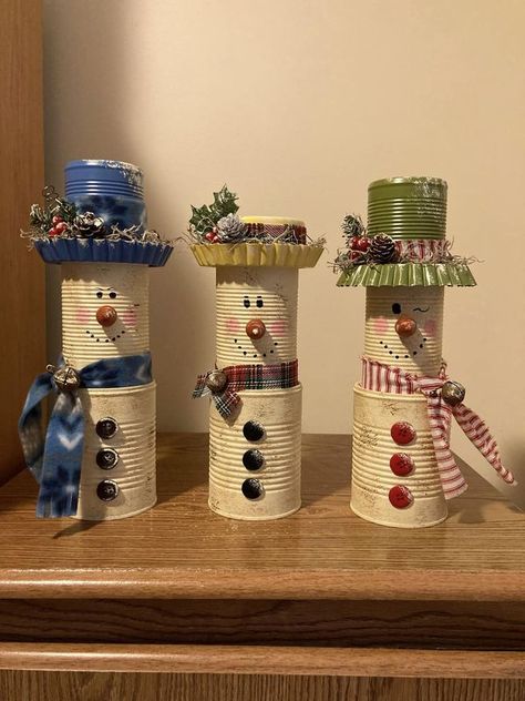 💲Dollar Tree Fanatics Crafts & Decor💲 | Just finished more snow people ☃️ Made from empty soup and vegetable cans that I get at Dollar Tree | Facebook Christmas Crafts With Tin Cans, Easy Snowmen Crafts, Tin Can Snowman Crafts, Tim Can Christmas Crafts, Can Snowman Craft, Dollar Tree Stackable Snowman, Snowman Hat From Tin Can, Tin Can Snowman, Snowman Out Of Coffee Creamer Bottle