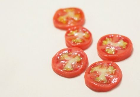 This is a cute way of getting very realistic tomato slices. Being a caner, I’d probably add a lot more of the colouring detail to the cane instead of doing it to individual slices but I have … Realistic Polymer Clay Food, Tomato Slice, Miniature Food Tutorials, Polymer Clay Cane Tutorial, Miniature Foods, Fimo Polymer Clay, How To Make Clay, Doll Food, Polymer Clay Canes