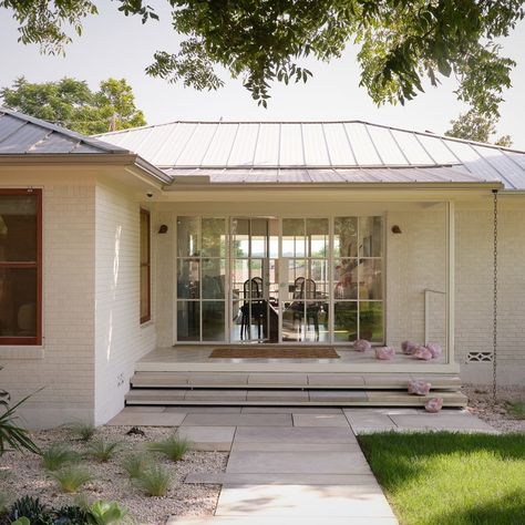 This 1950s Austin Bungalow Is a Sophisticated Slant on Pink | Architectural Digest 1950s Bungalow Exterior, 1950 House Exterior, 1950s Ranch House Exterior, 1950s Ranch Remodel, 1960s Ranch House Exterior, 1950 House, Ashe Leandro, 1940s Bungalow, Mid Century Renovation