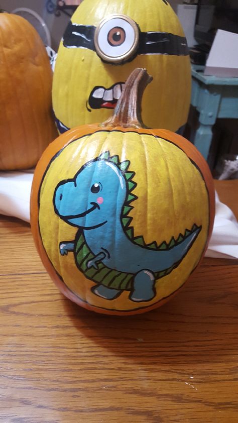 Baby dinosaur Halloween pumpkin for children that I painted Diy Pumpkins Painting, Dinosaur Pumpkin, Pumpkin Designs Painted, Pumpkin Painting Party, Halloween Pumpkin Crafts, Creative Pumpkin Painting, Creative Pumpkin Decorating, Cute Pumpkin Carving, Dinosaur Halloween