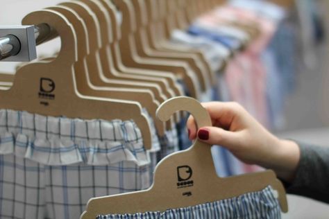 Cardboard Hanger, Sustainable Marketing, Clothing Hangers, Fabric Hanger, Cardboard Recycling, Clothing Labels Design, Labels Design, Pant Hangers, Hanger Design