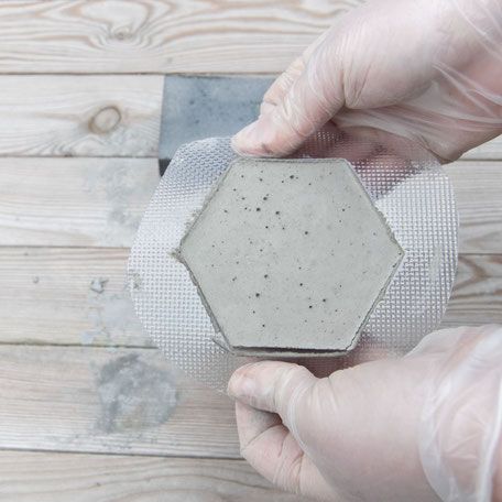 Diy Concrete Tiles, Coaster Tutorial, Hexagon Coaster, Expensive Furniture, Hexagon Coasters, Diy Concrete, Diy Tile, Concrete Molds, Concrete Crafts