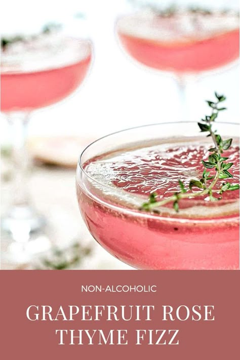 Bright citrusy, floral herbaceous slightly sweet, it's the perfect drink.  #mocktails #nonalcoholic #spirtfree #non-alcoholic #rosecocktails #grapefruitdrinks #thymedrinks #prettydrinks #romanticdrinks #valentinescocktails #Grapefruitrosedrinks Flower Mocktails, Mocktail Inspiration, Botanical Drinks, Classy Cocktails, Mocktail Party, Best Non Alcoholic Drinks, Rose Drink, Floral Drink, Drink Recipes Nonalcoholic