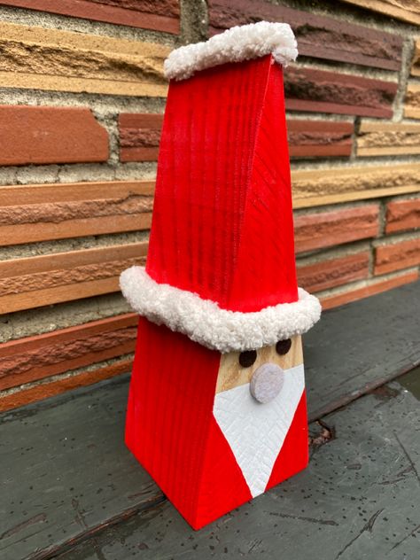 This Santa is a simple, wooden triangle. He has felt eyes and nose. The hat is trimmed out with thick yarn. Triangle Craft, Outdoor Snowman, Felt Eyes, Snowman Craft, Wooden Reindeer, Pallet Christmas, Christmas Wine Bottles, Christmas Arts And Crafts, Wooden Santa