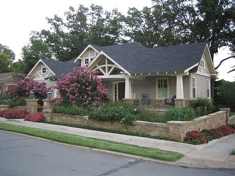 A unique project--turning a ranch house in an historic neighborhood of Craftsman bungalows and various 1910s and 20s period revivals into--a welcoming Craftsman with a Southern-sized front porch and an extensively gardened yard.  The project added a 2nd story, an upstairs porch, a large dining room, as well as a rather radical aesthetic overhaul. House Exterior Renovation, Craftsman Style Exterior, Ranch House Exterior, Craftsman Cottage, Craftsman Bungalow, Bungalow Homes, Craftsman Exterior, Cottages And Bungalows, Exterior Renovation